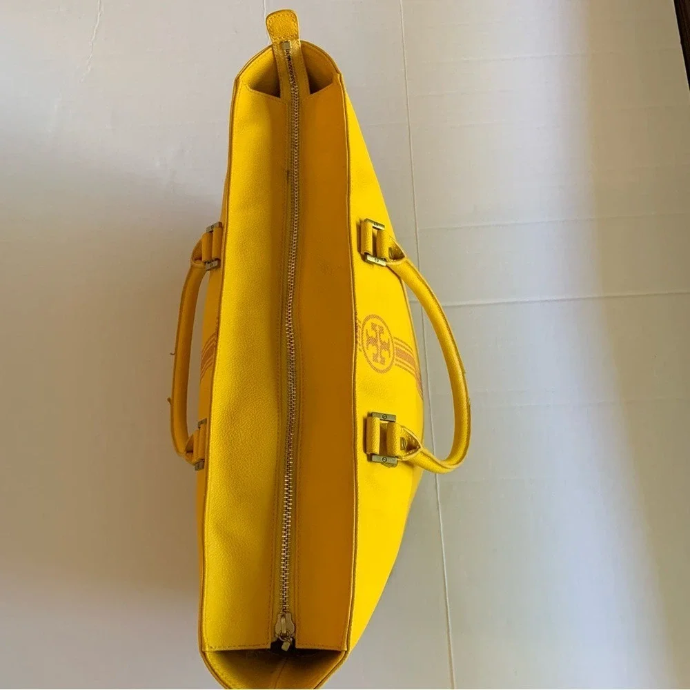 TORY BURCH. Yellow Leather Pebbled Roslyn‎ bag w/ stripes & a Logo accent.